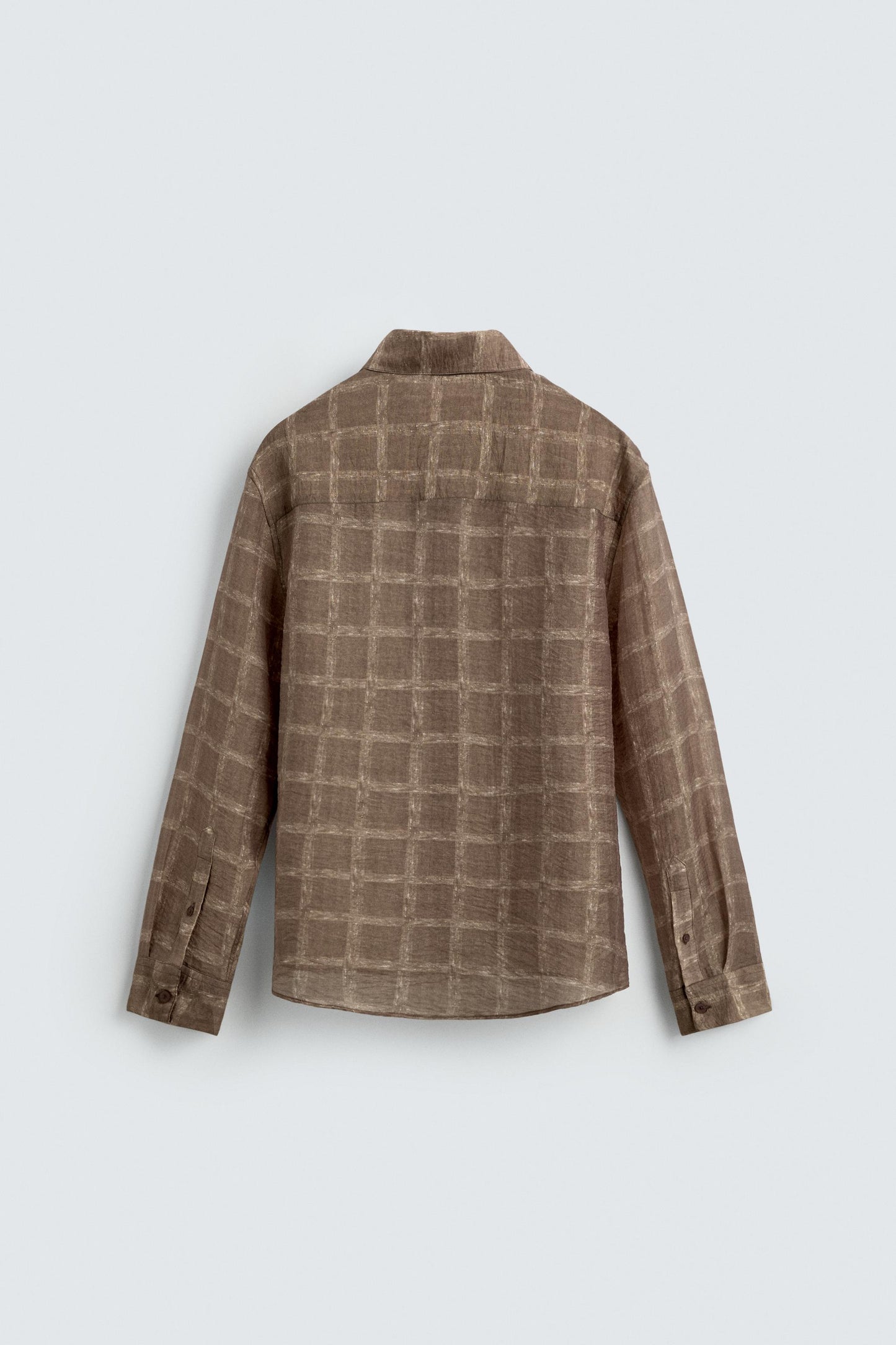 CAMISA SEMITRANSPARENTE AOS QUADRADOS