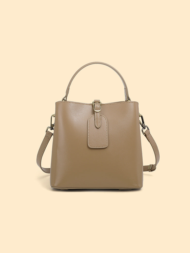 Malas femininas, nova bolsa versátil primavera/verão 2025, mala crossbody de grande capacidade de alta gama, mala de ombro simples em pele genuína