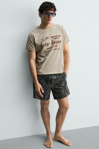 T-SHIRT ESTAMPADA COM MENSAGEM E EFEITO VINTAGE