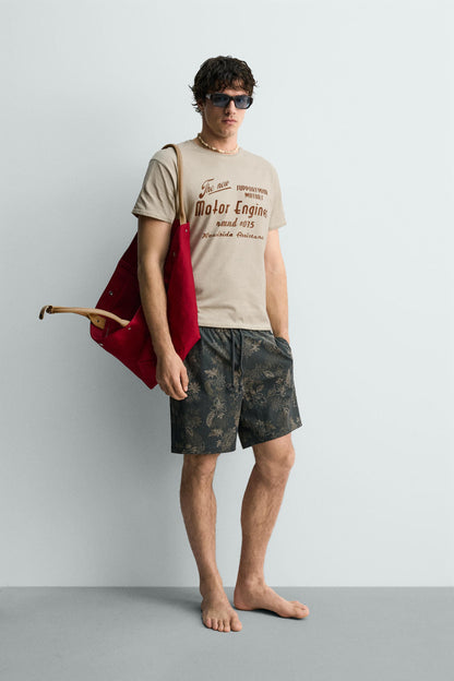 T-SHIRT ESTAMPADA COM MENSAGEM E EFEITO VINTAGE