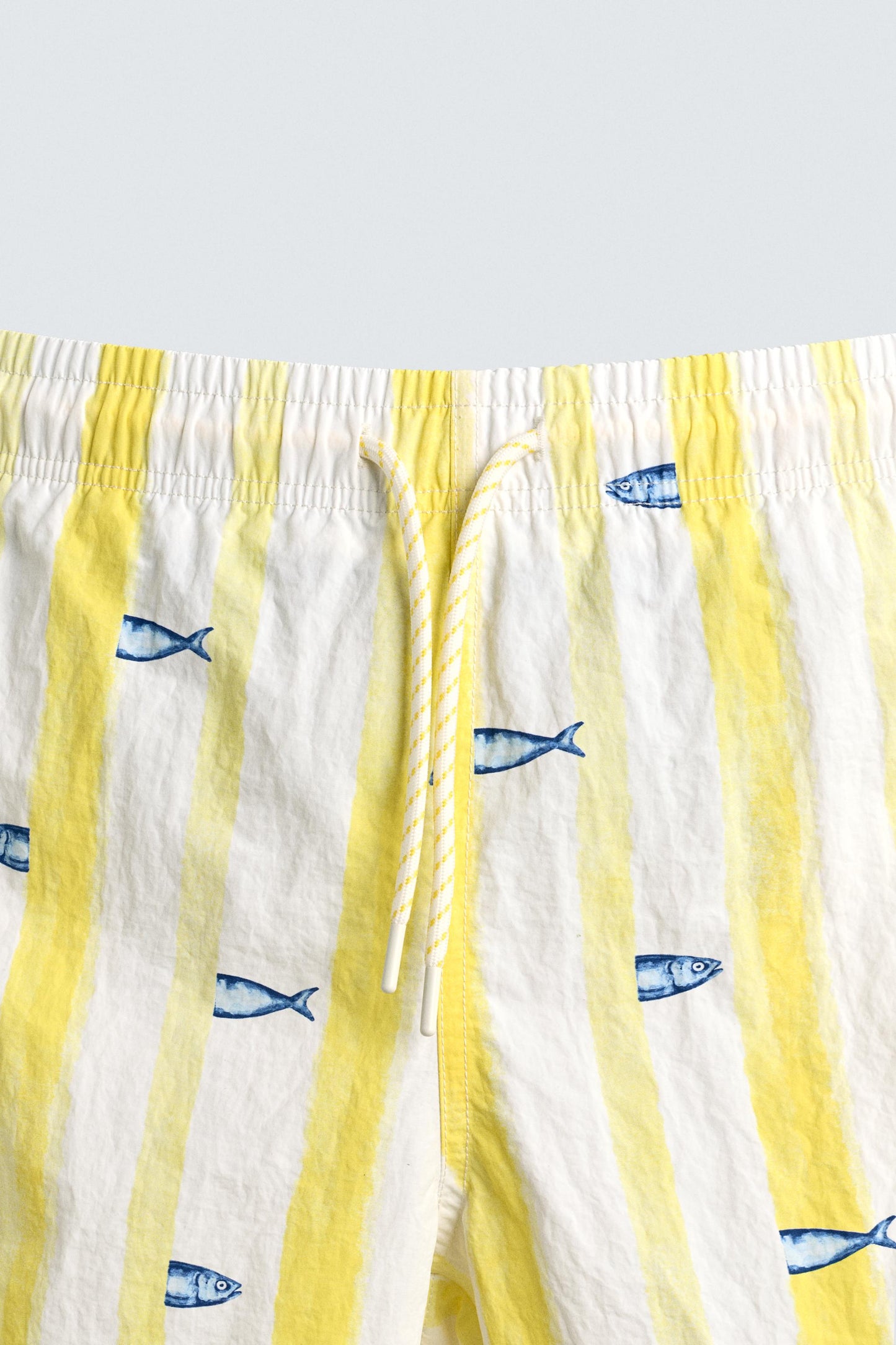 CALÇÕES DE BANHO COMPRIDOS COM ESTAMPADO DE PEIXES