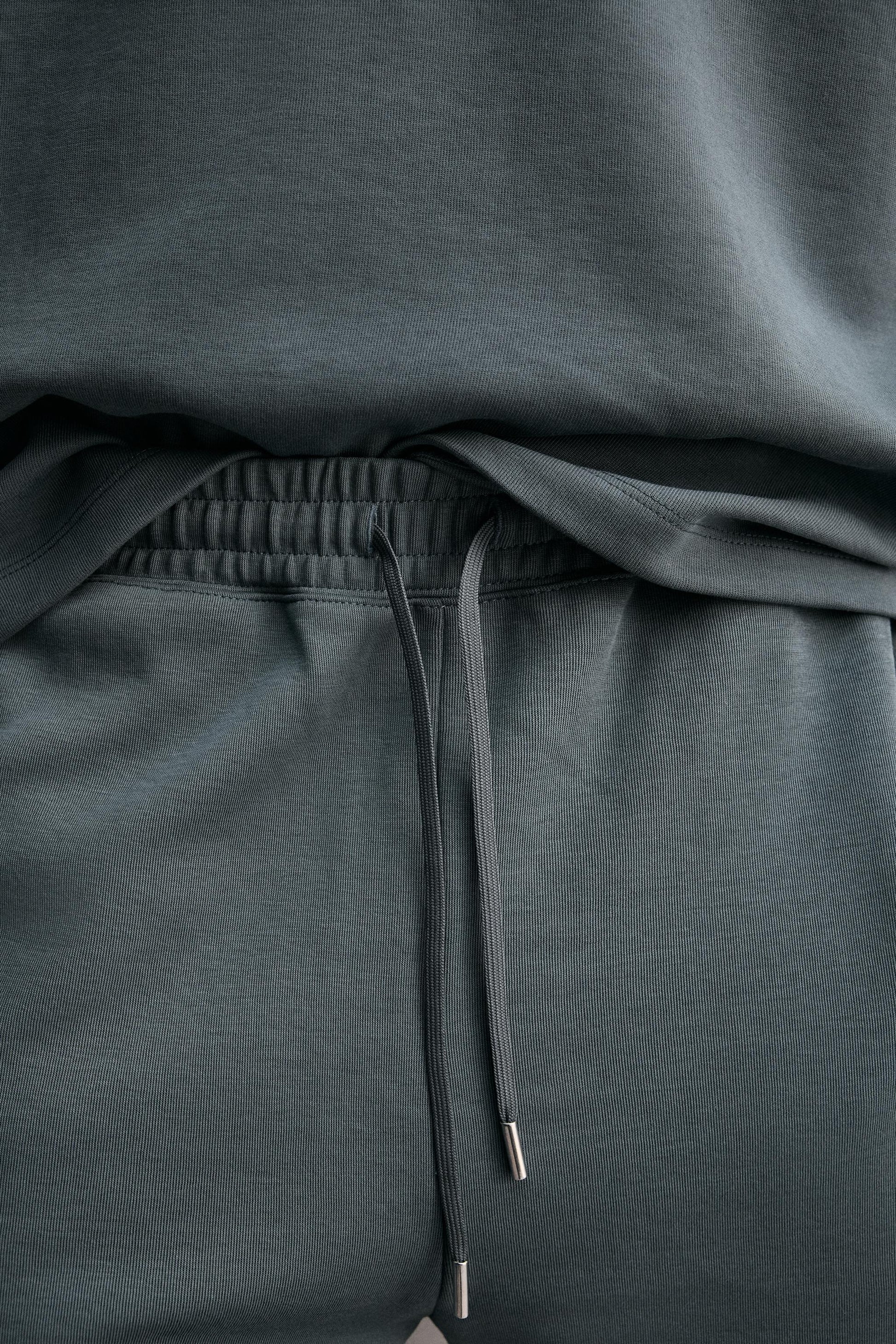 CALÇÕES BERMUDA JOGGER RELAX FIT INTERLOCK