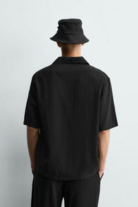 POLO FLUIDO RELAXED FIT