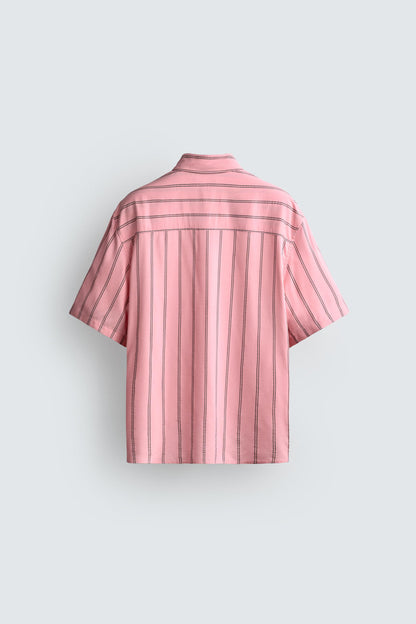 CAMISA FLUIDA ÀS RISCAS COM BOLSOS