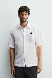 CAMISA JACQUARD ÀS RISCAS