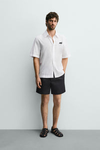 CAMISA JACQUARD ÀS RISCAS