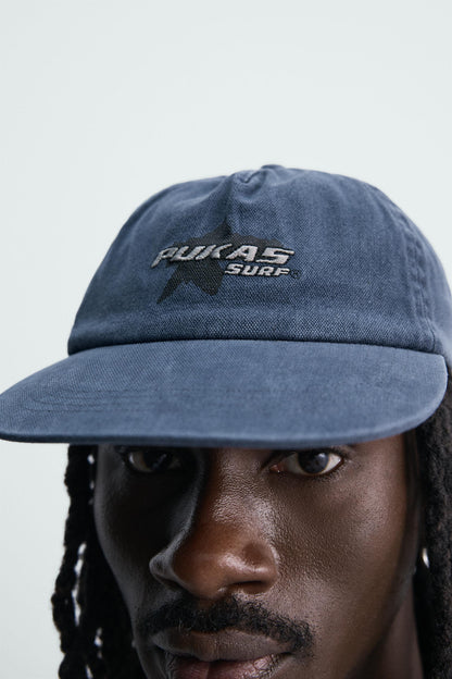BONÉ VISEIRA PLANA PUKAS SURF X ZARA