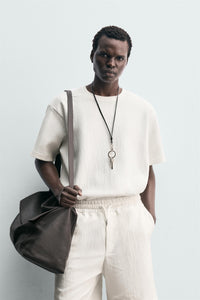 T-SHIRT RELAXED FIT ESTRUTURADA