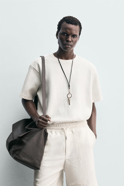 T-SHIRT RELAXED FIT ESTRUTURADA