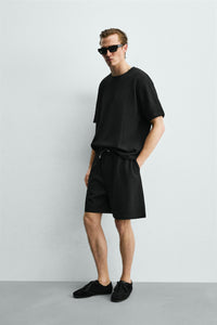 T-SHIRT RELAXED FIT ESTRUTURADA