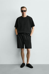 T-SHIRT RELAXED FIT ESTRUTURADA