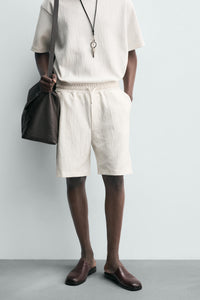 CALÇÕES BERMUDA JOGGER COM ESTRUTURA