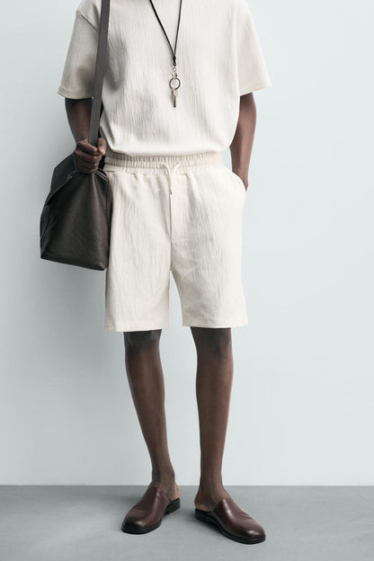 CALÇÕES BERMUDA JOGGER COM ESTRUTURA