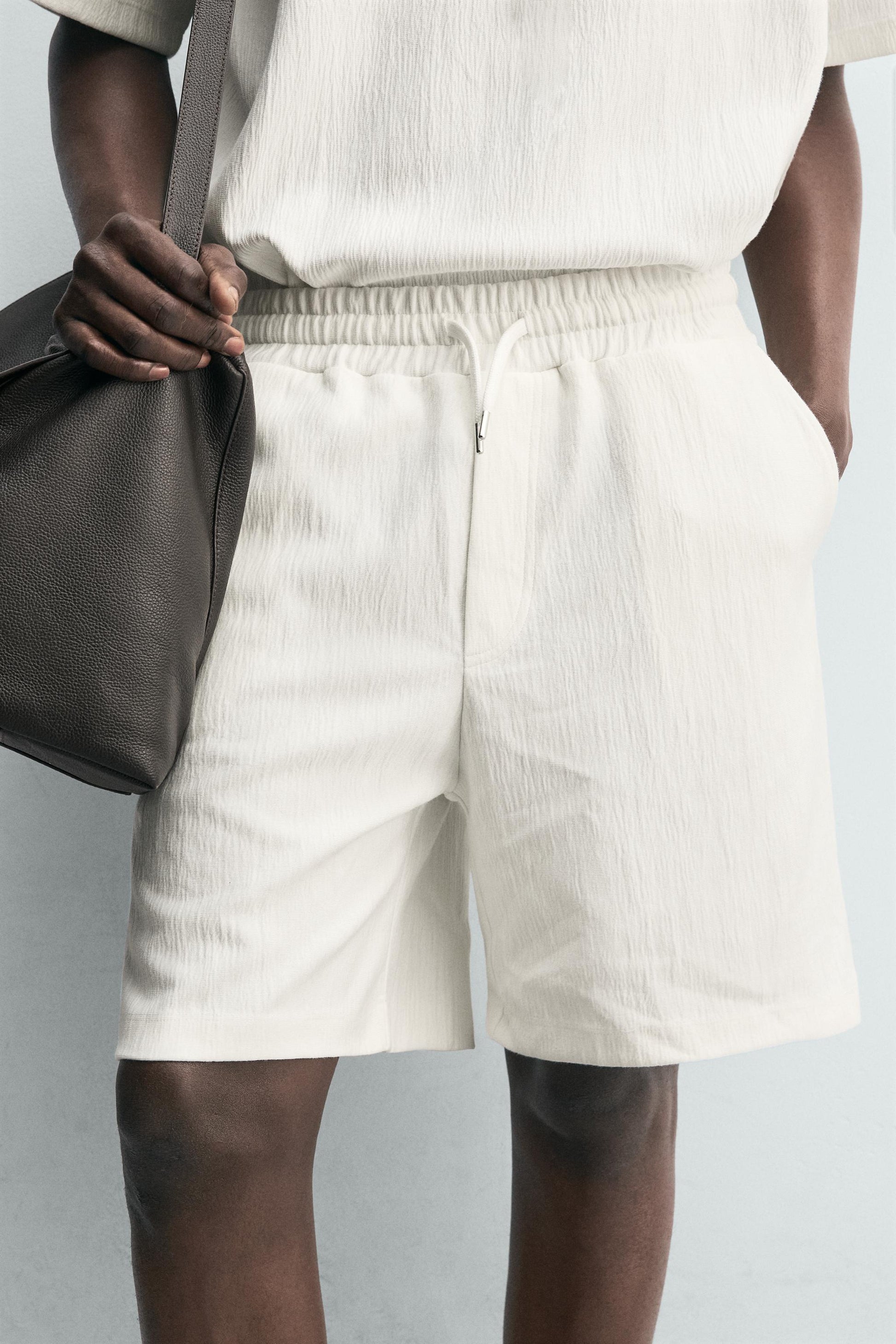 CALÇÕES BERMUDA JOGGER COM ESTRUTURA