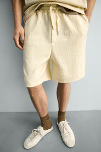 CALÇÕES BERMUDA JOGGER COM ESTRUTURA