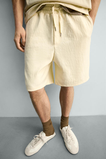 CALÇÕES BERMUDA JOGGER COM ESTRUTURA