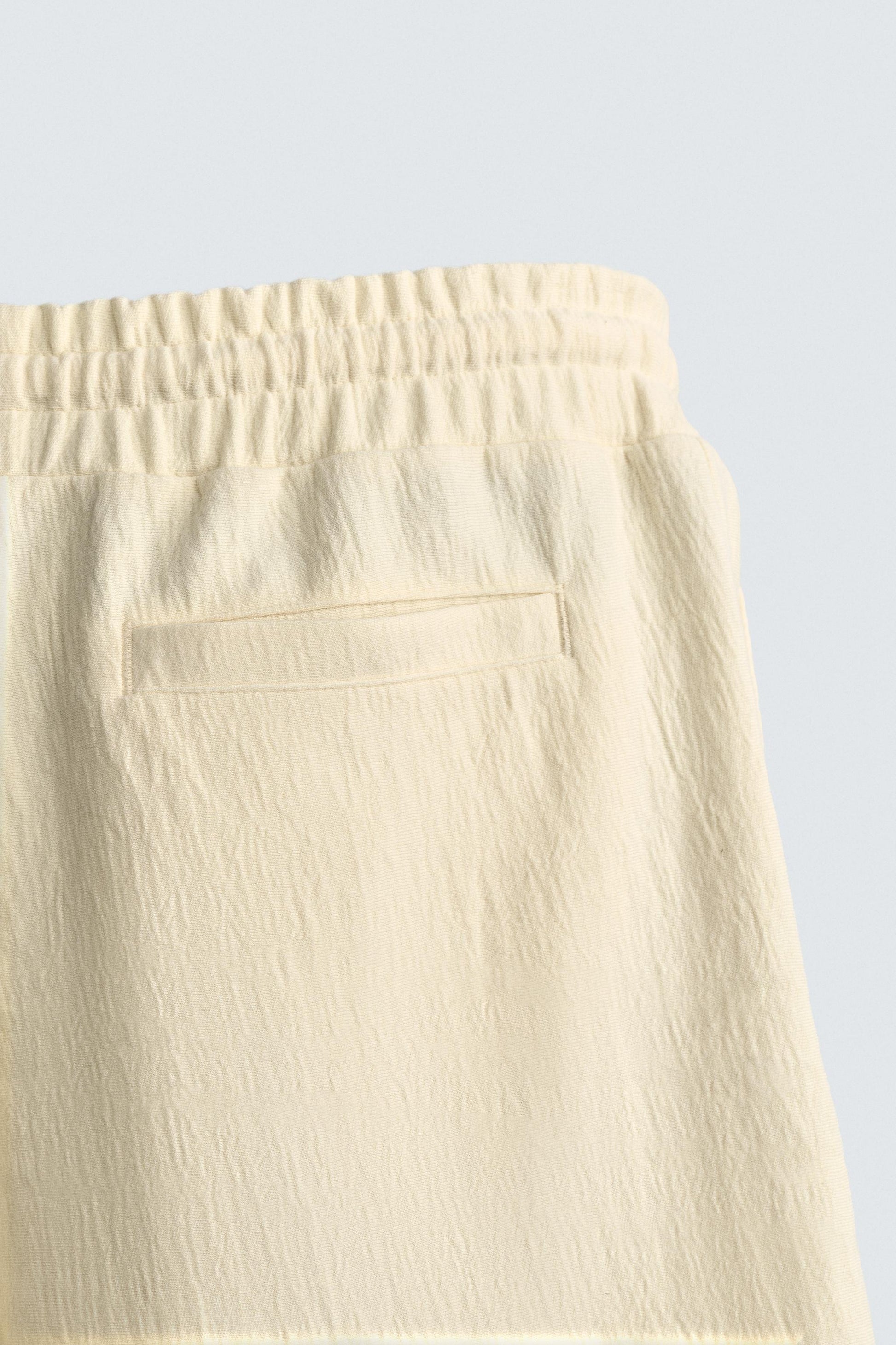 CALÇÕES BERMUDA JOGGER COM ESTRUTURA