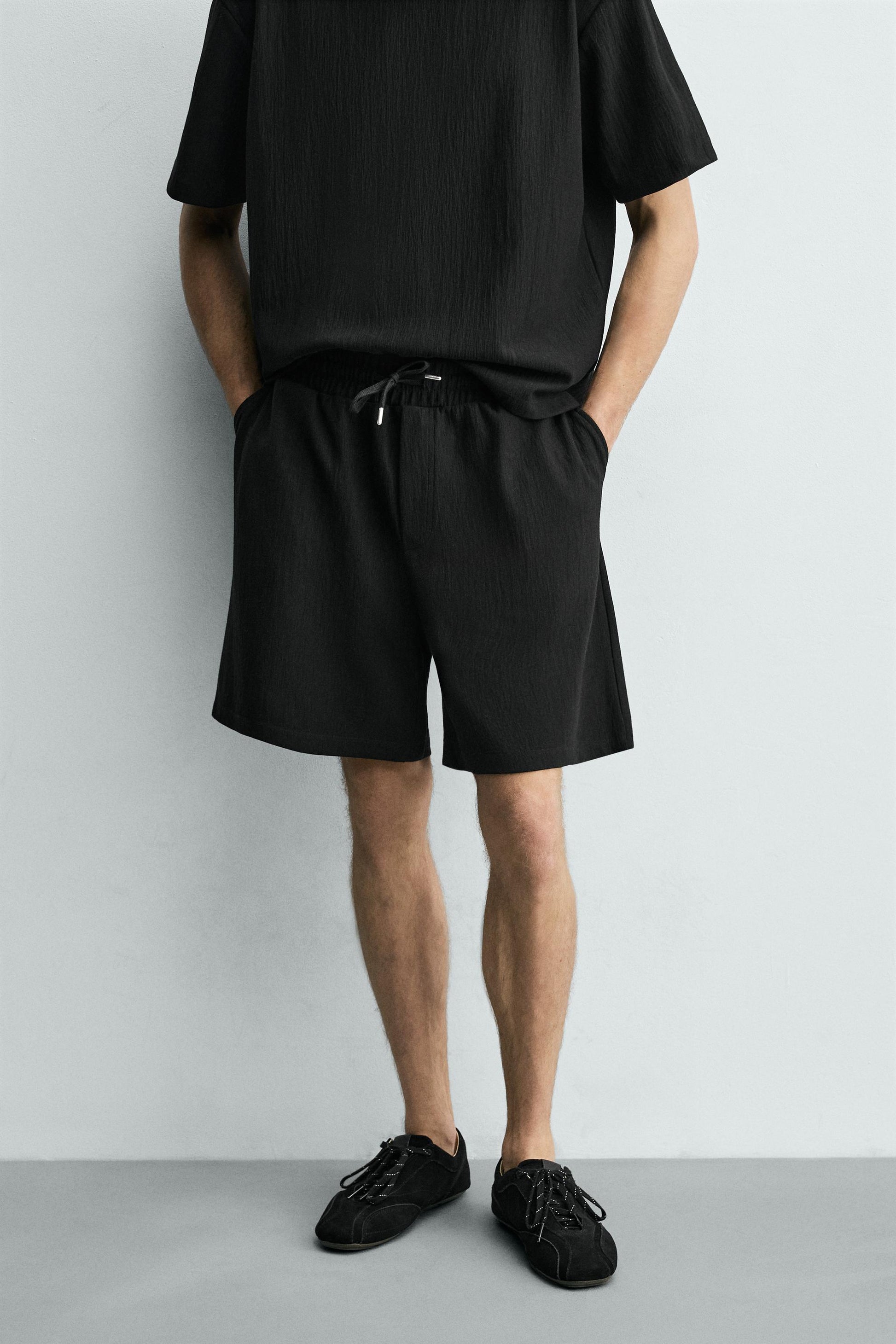 CALÇÕES BERMUDA JOGGER COM ESTRUTURA