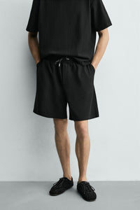 CALÇÕES BERMUDA JOGGER COM ESTRUTURA