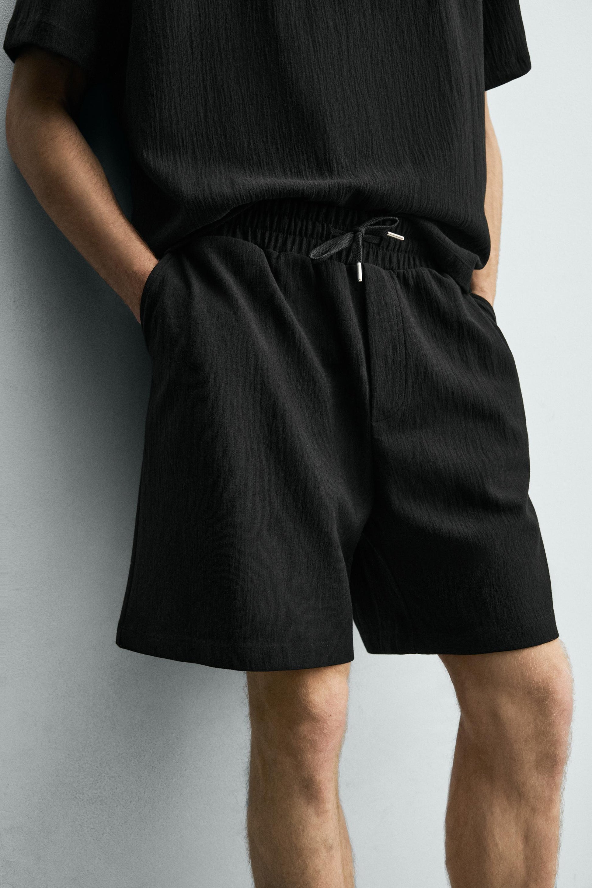 CALÇÕES BERMUDA JOGGER COM ESTRUTURA