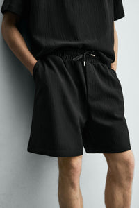 CALÇÕES BERMUDA JOGGER COM ESTRUTURA