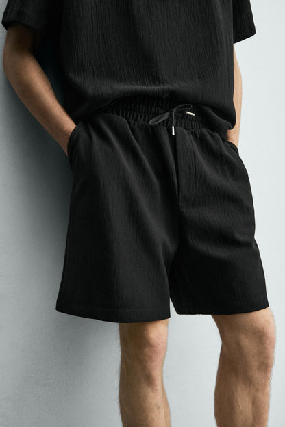 CALÇÕES BERMUDA JOGGER COM ESTRUTURA