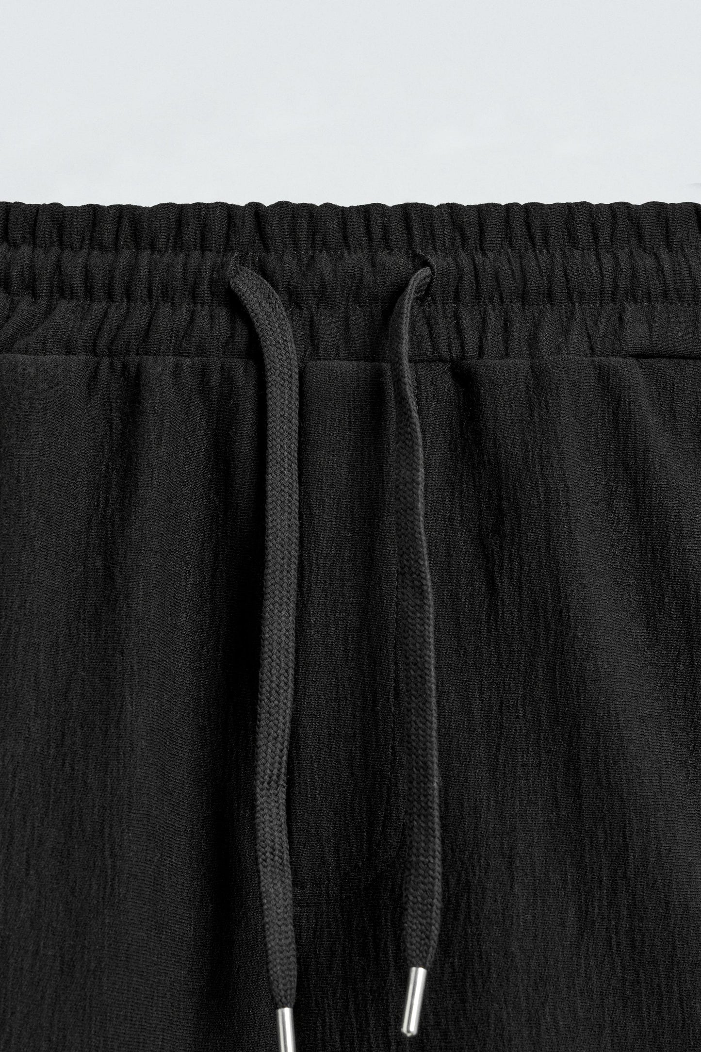 CALÇÕES BERMUDA JOGGER COM ESTRUTURA