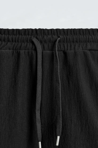 CALÇÕES BERMUDA JOGGER COM ESTRUTURA