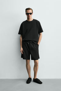 CALÇÕES BERMUDA JOGGER COM ESTRUTURA