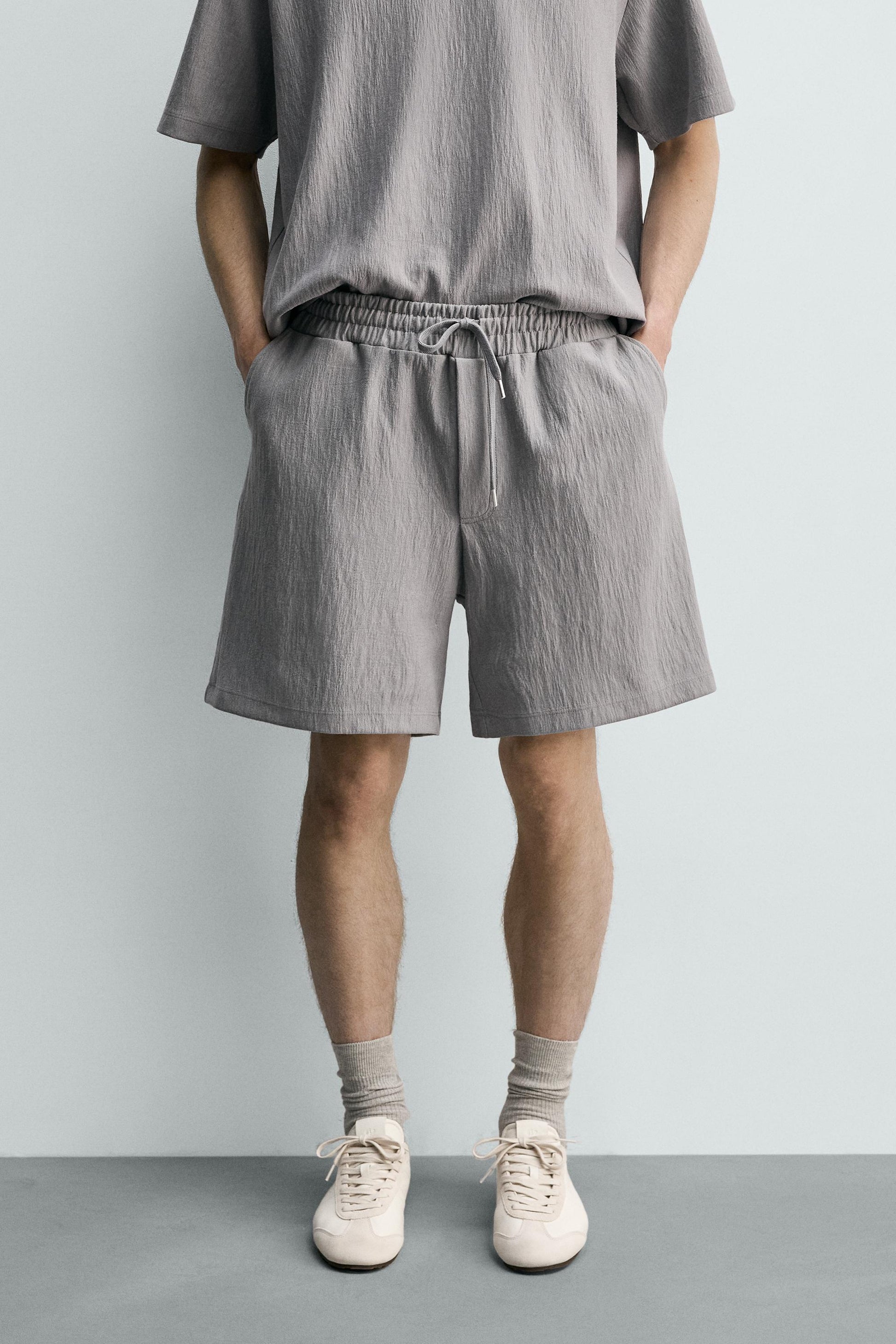 CALÇÕES BERMUDA JOGGER COM ESTRUTURA