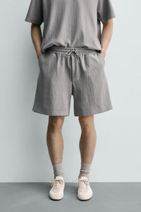 CALÇÕES BERMUDA JOGGER COM ESTRUTURA