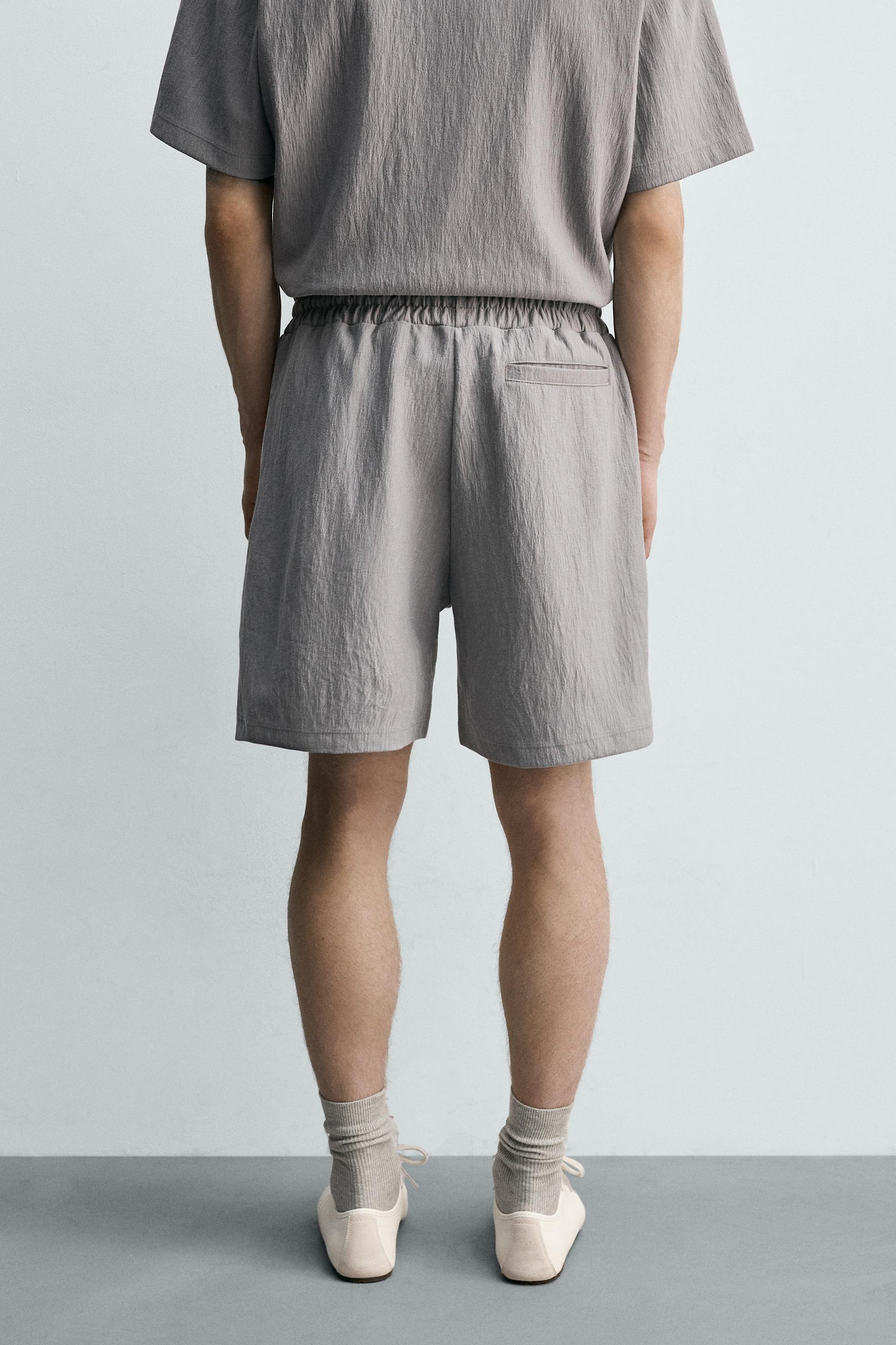 CALÇÕES BERMUDA JOGGER COM ESTRUTURA