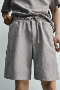 CALÇÕES BERMUDA JOGGER COM ESTRUTURA