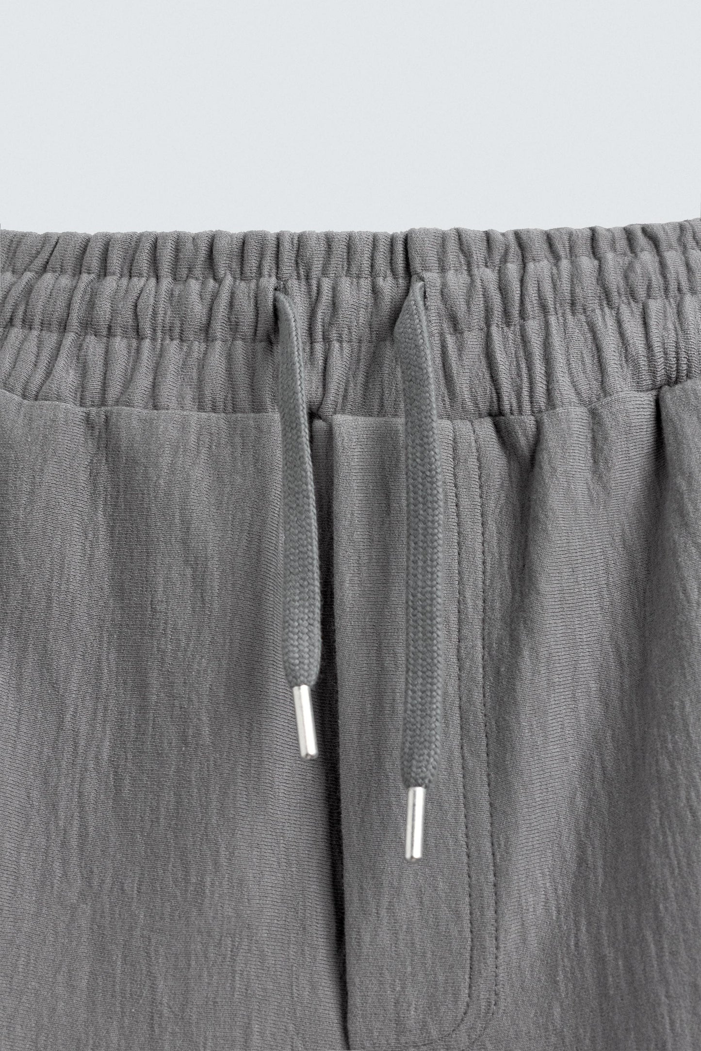 CALÇÕES BERMUDA JOGGER COM ESTRUTURA