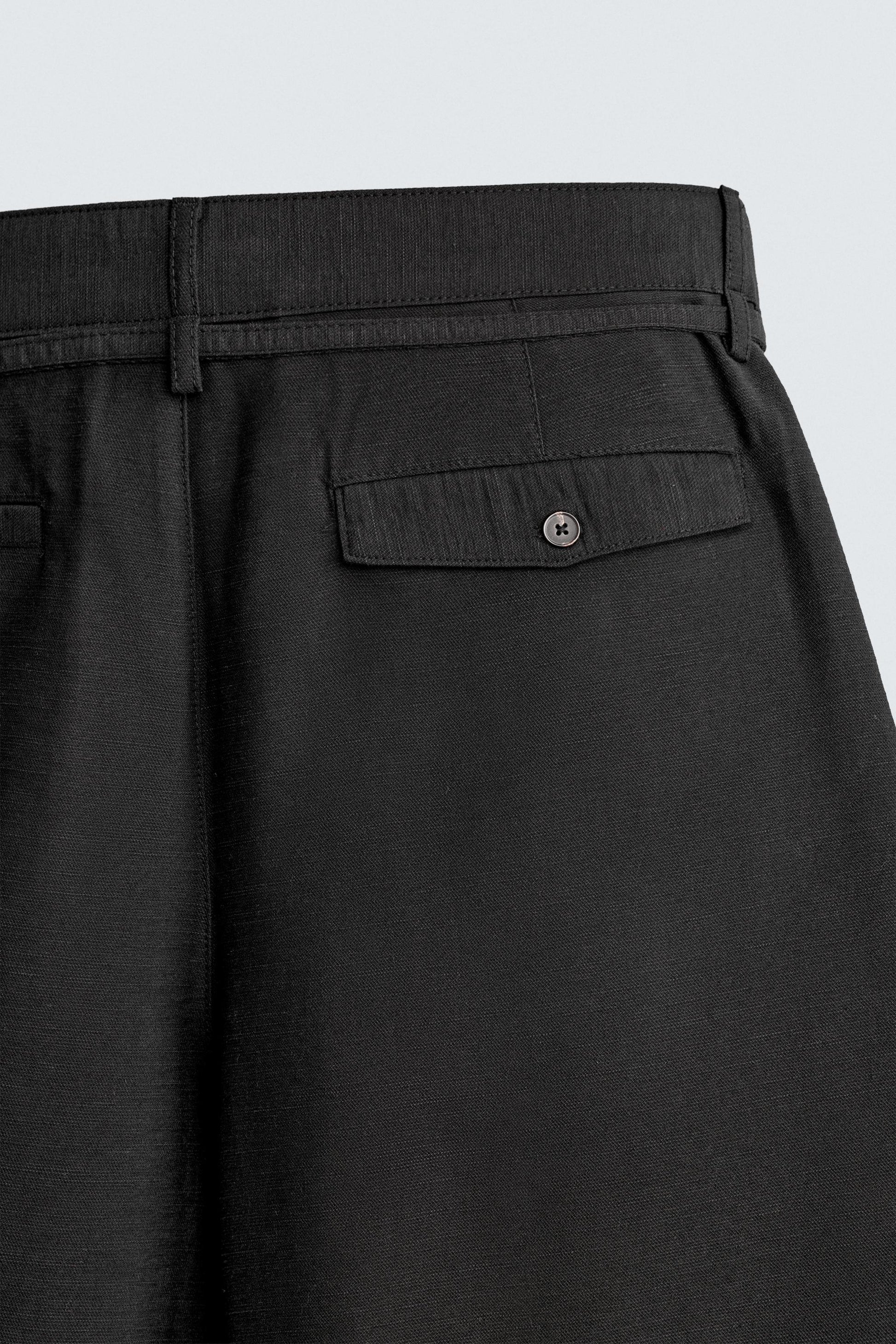 CALÇÕES BERMUDA RELAXED FIT COM PREGAS E CINTO