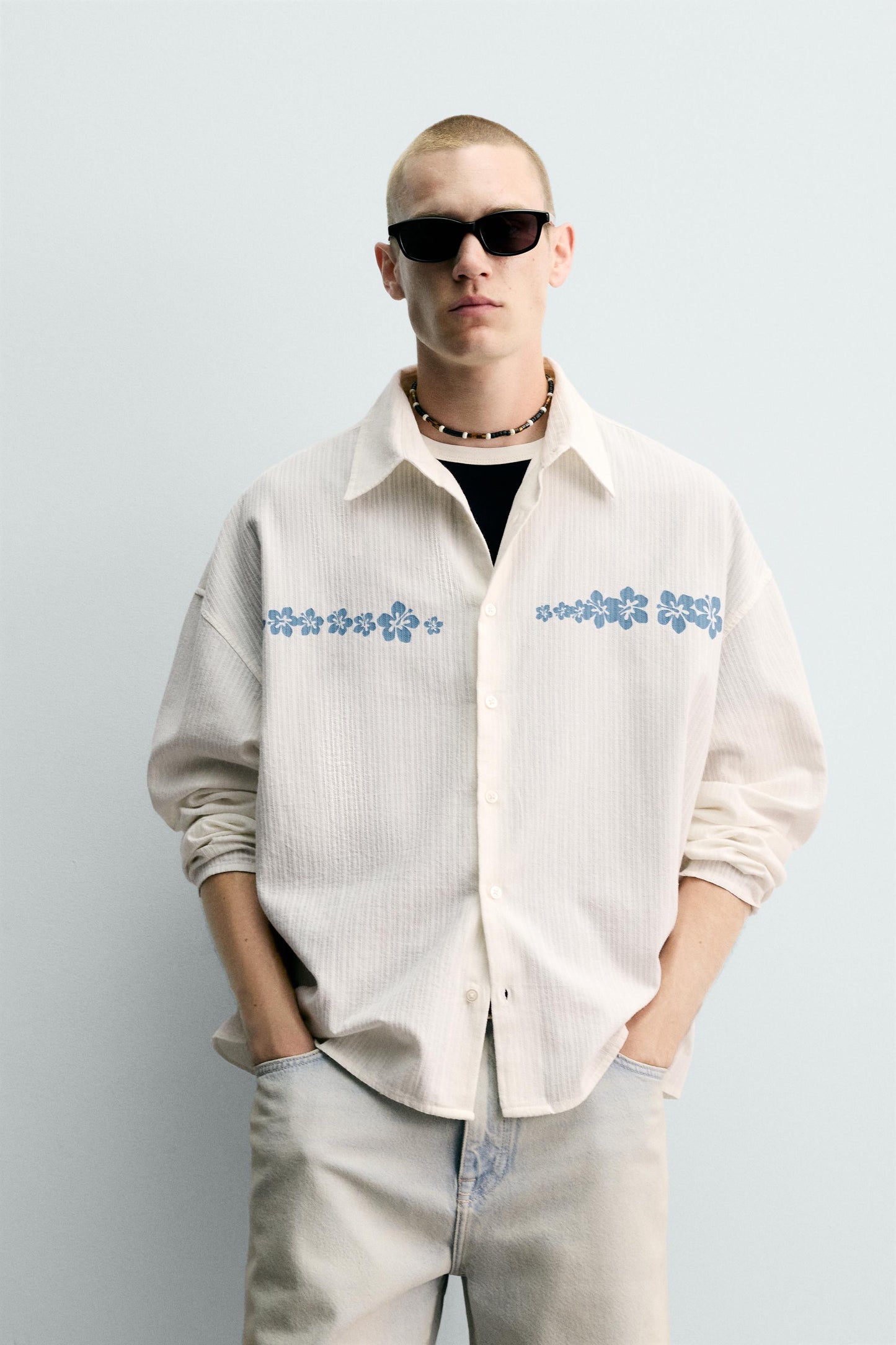 CAMISA RELAXED FIT COM ESTAMPADO DE FLORES