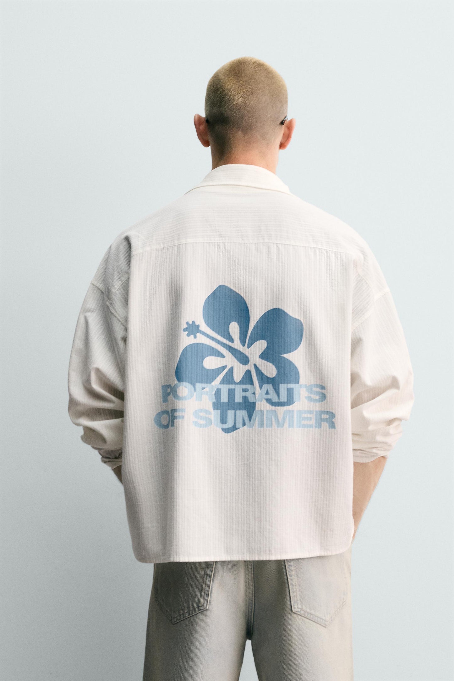 CAMISA RELAXED FIT COM ESTAMPADO DE FLORES