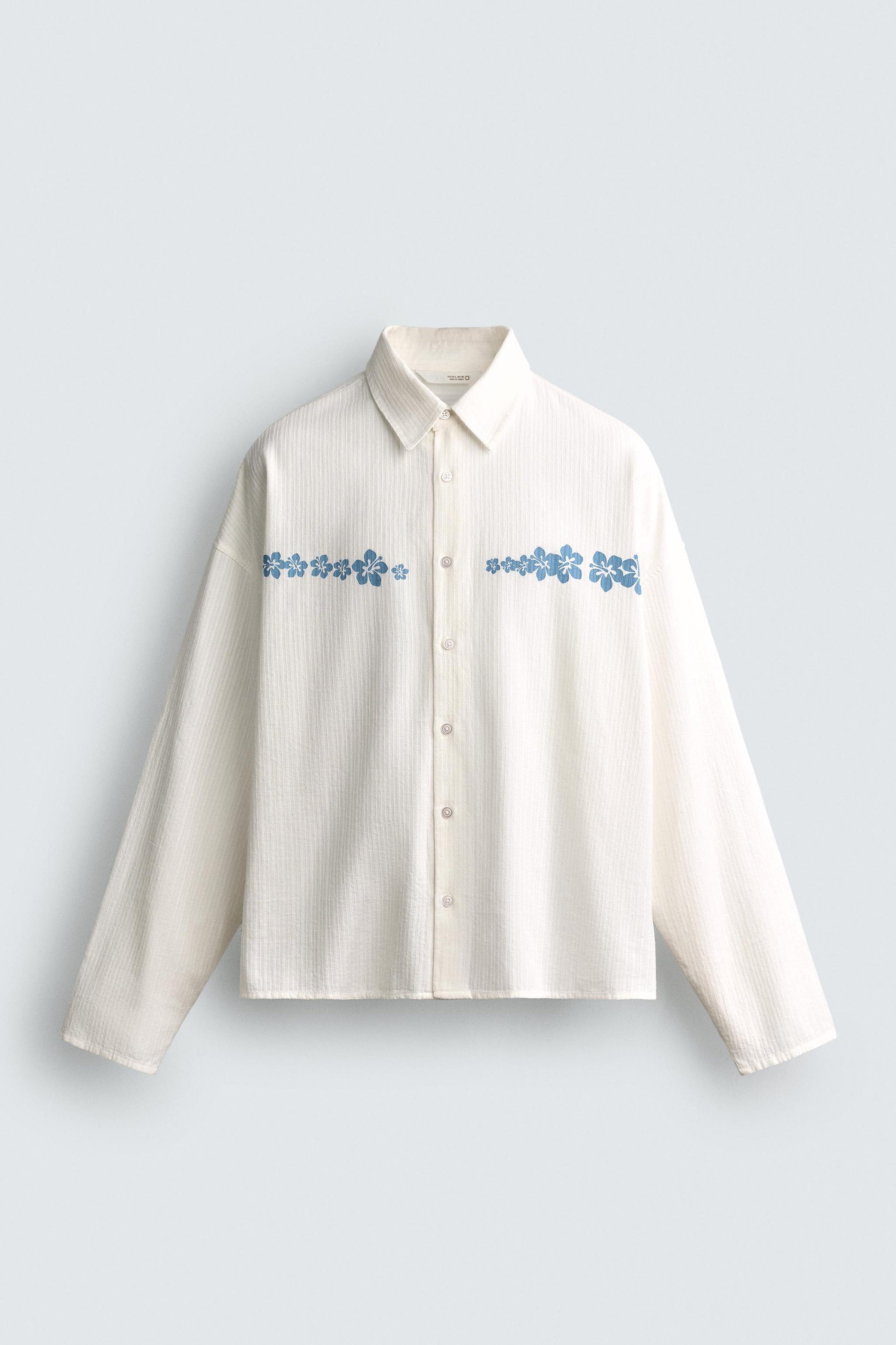 CAMISA RELAXED FIT COM ESTAMPADO DE FLORES