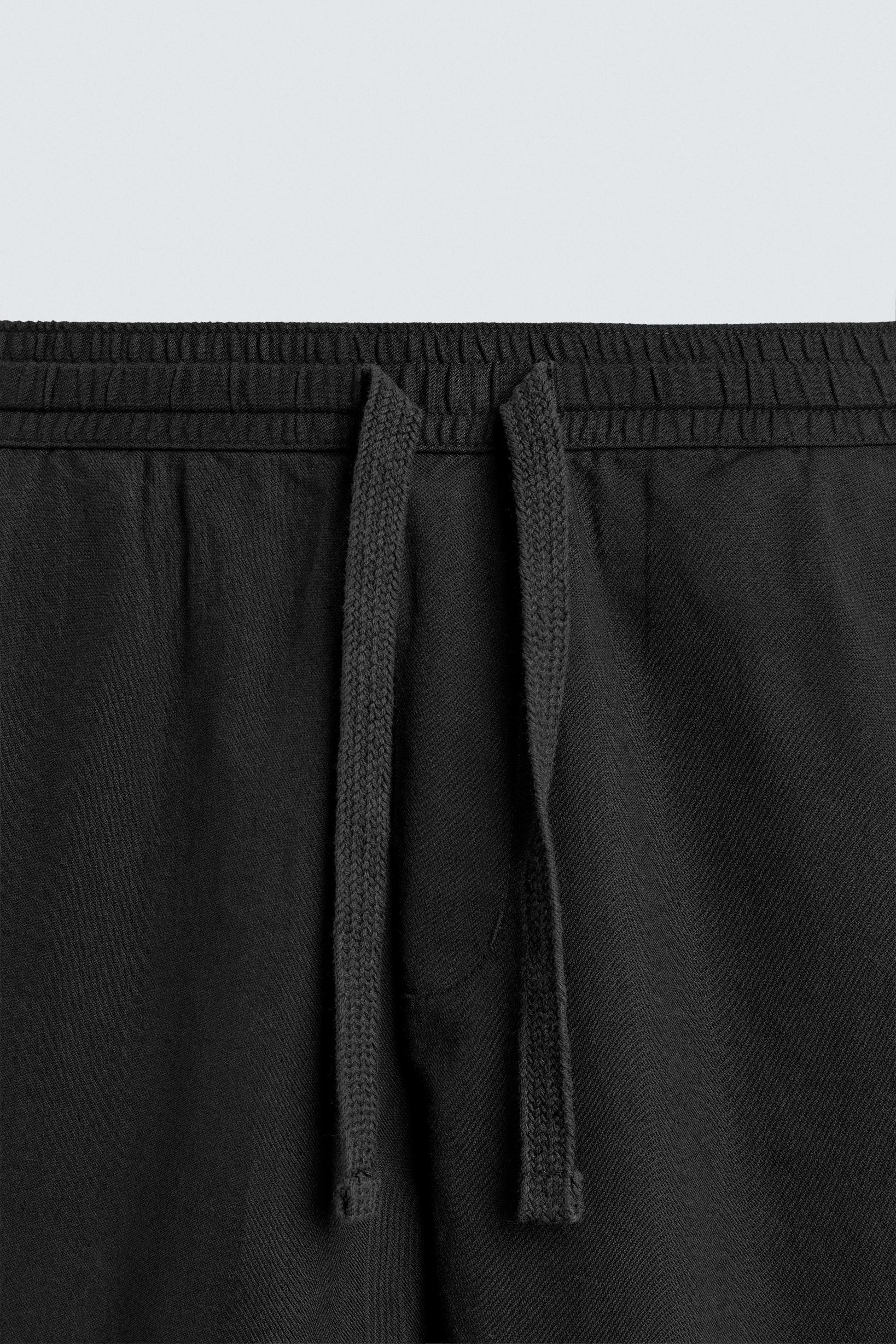 CALÇAS RELAXED FIT MISTURA ALGODÃO
