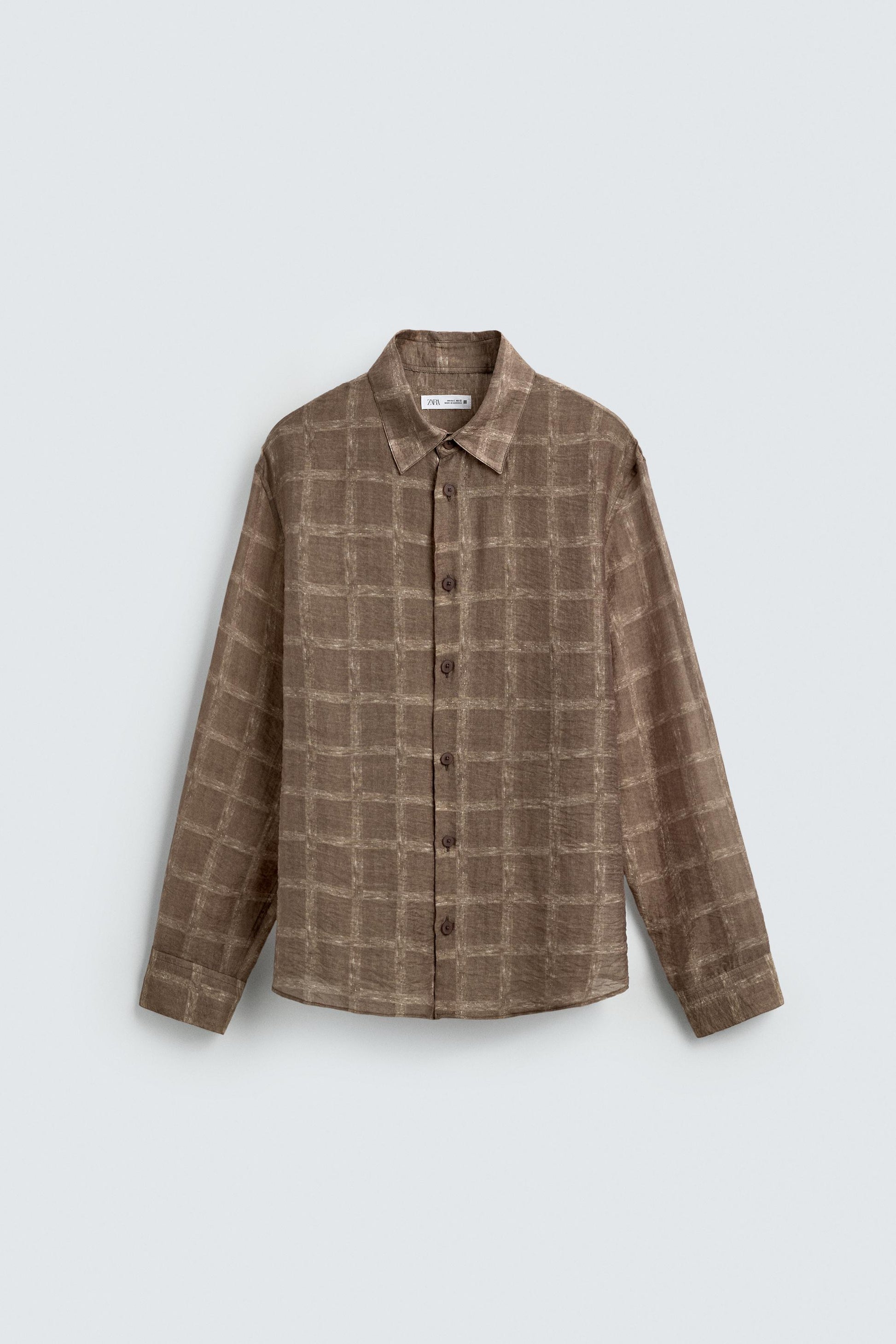 CAMISA SEMITRANSPARENTE AOS QUADRADOS