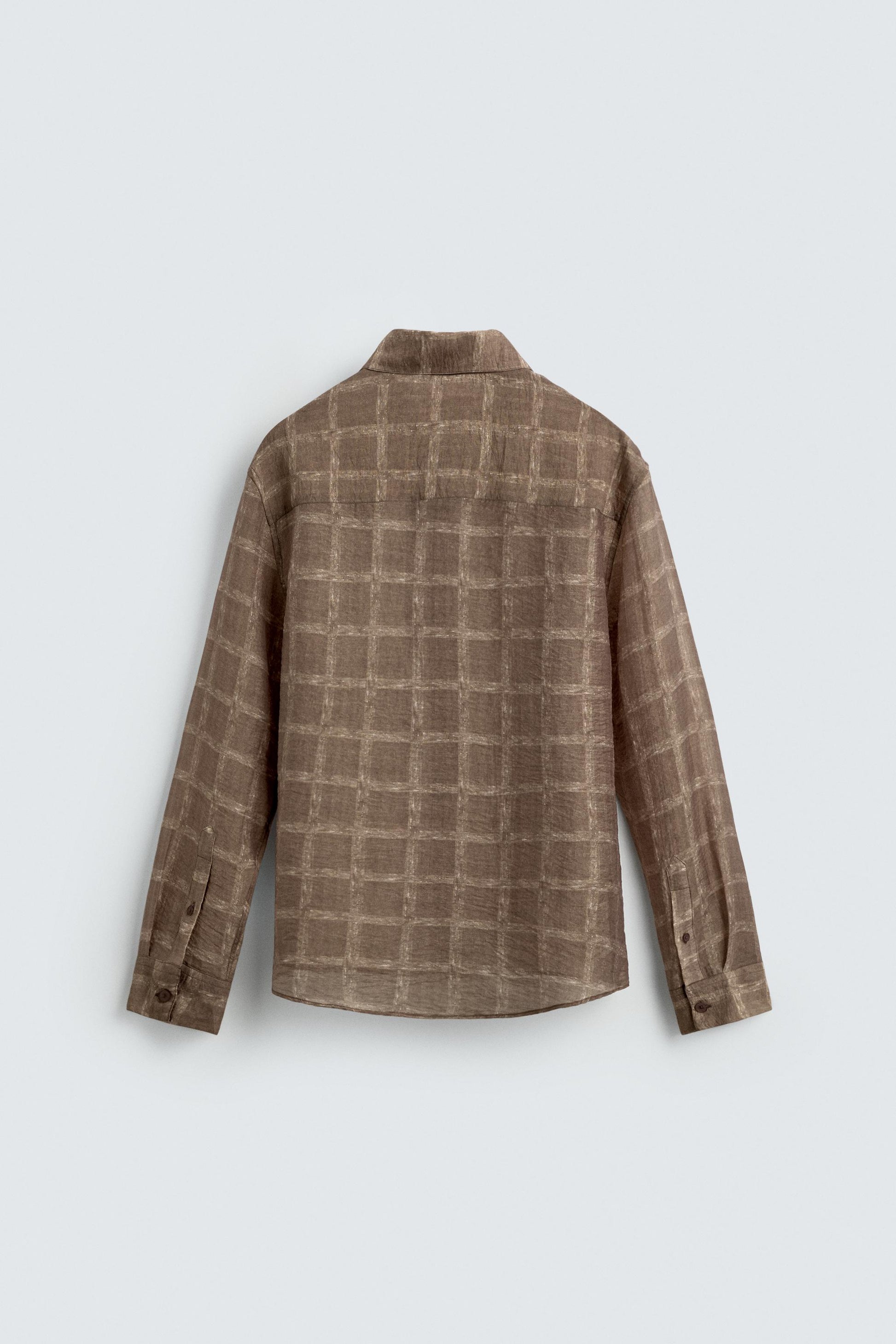 CAMISA SEMITRANSPARENTE AOS QUADRADOS