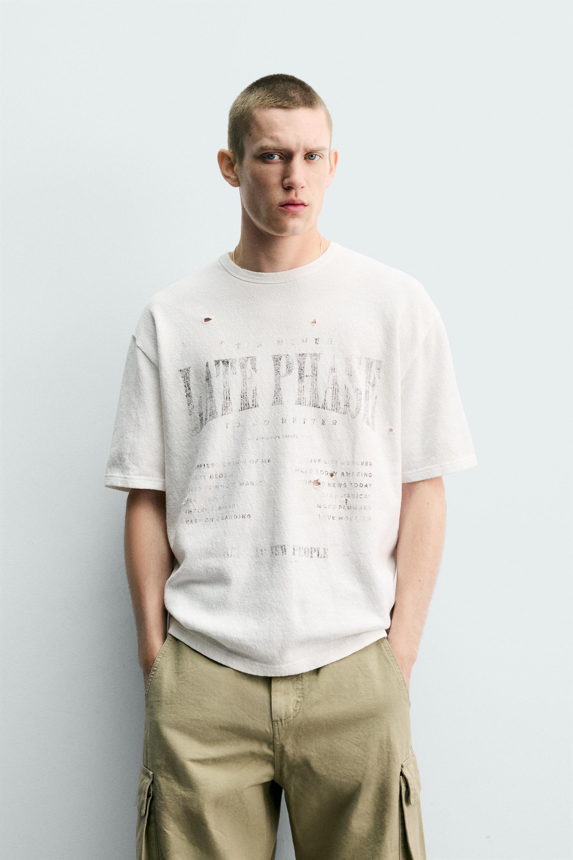 T-SHIRT DE MALHA ESTAMPADA COM LAVAGEM
