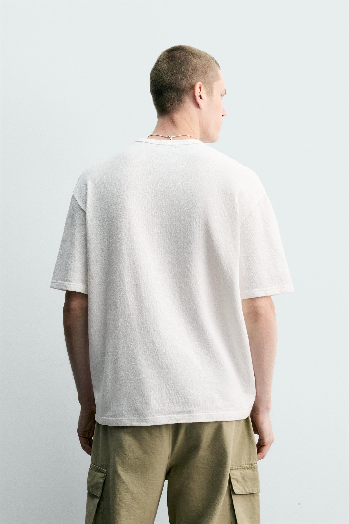 T-SHIRT DE MALHA ESTAMPADA COM LAVAGEM