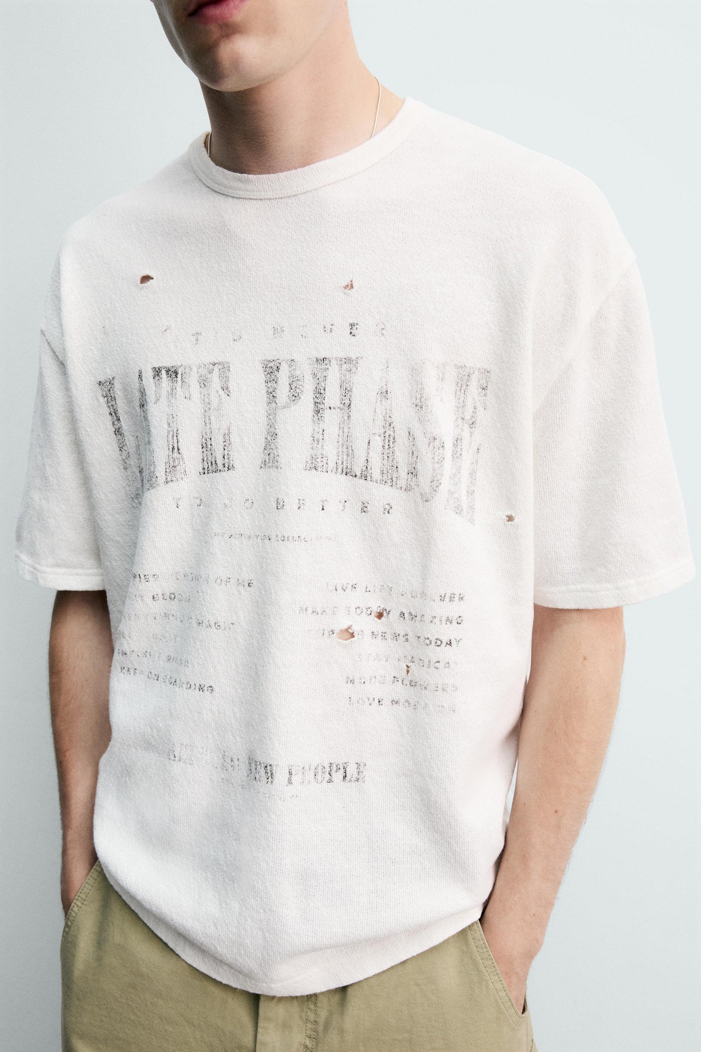 T-SHIRT DE MALHA ESTAMPADA COM LAVAGEM
