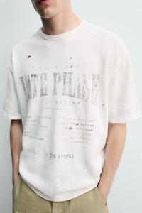 T-SHIRT DE MALHA ESTAMPADA COM LAVAGEM