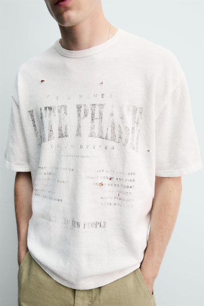 T-SHIRT DE MALHA ESTAMPADA COM LAVAGEM