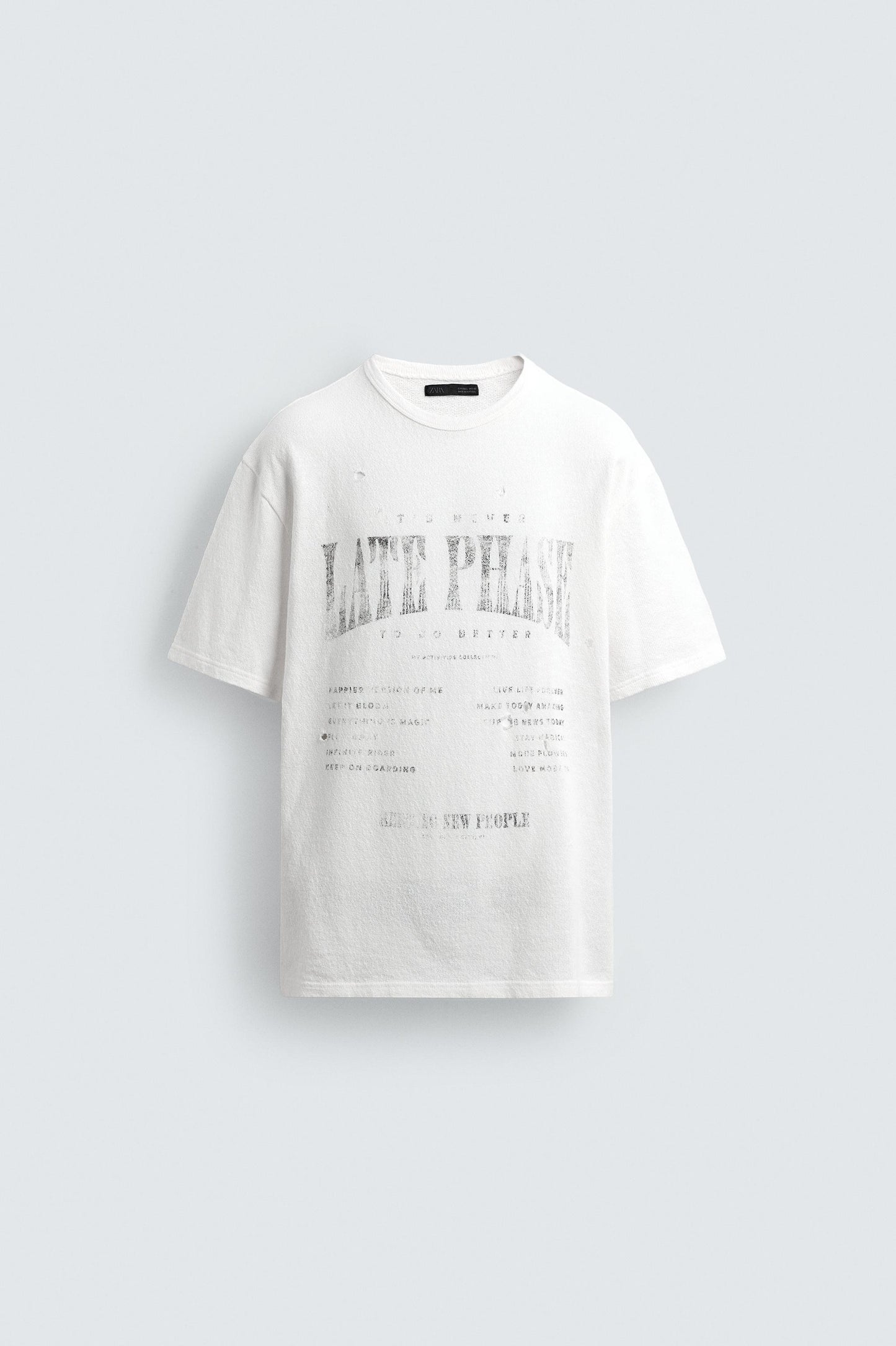 T-SHIRT DE MALHA ESTAMPADA COM LAVAGEM