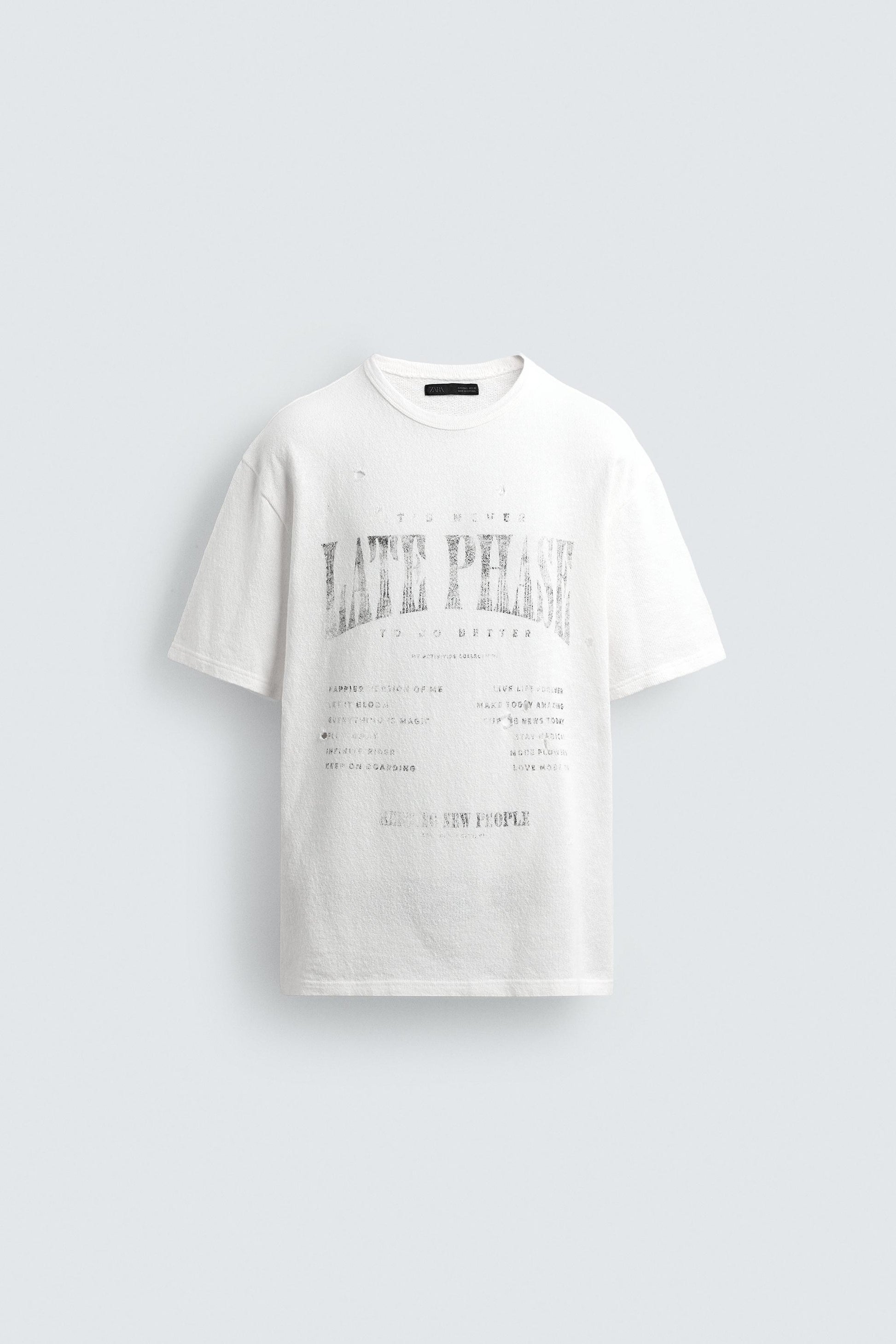 T-SHIRT DE MALHA ESTAMPADA COM LAVAGEM