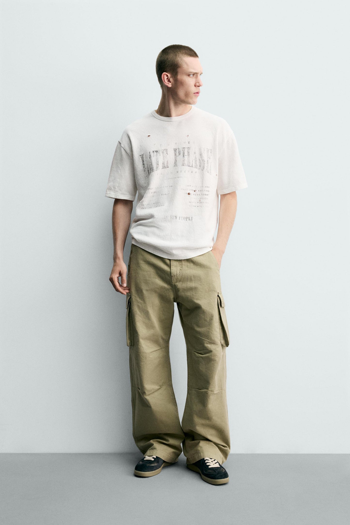 T-SHIRT DE MALHA ESTAMPADA COM LAVAGEM