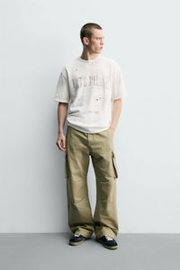 T-SHIRT DE MALHA ESTAMPADA COM LAVAGEM